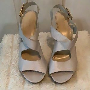 Nine West platform heels. Open toe with wide crisscross buckle straps.